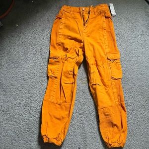 Orange urban outfitters cargo pants NWT size Medium